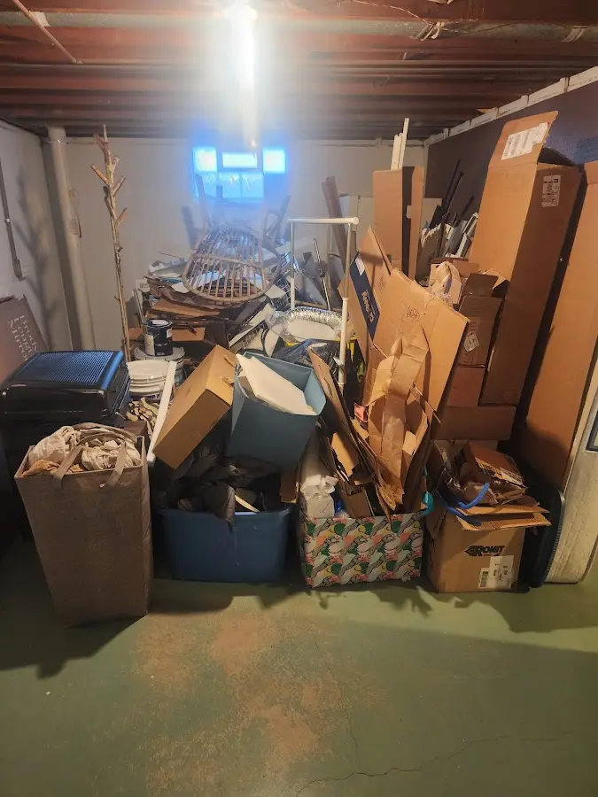 Roll-off dumpster container at job site for 2 Yard Dumpster Rental in Weatherford